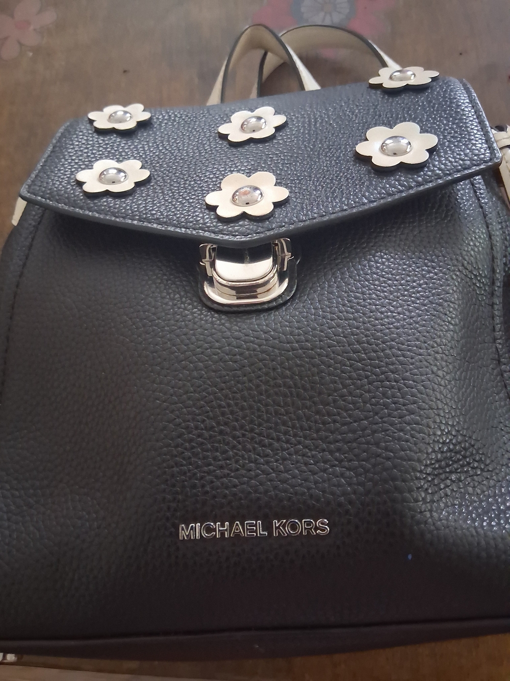 Michael Kors Black Pebbled Leather Flower-Embellished Backpack - Picture 1 of 4